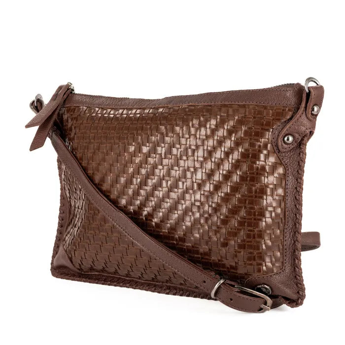 Brown woven handbag with a strap on a white background