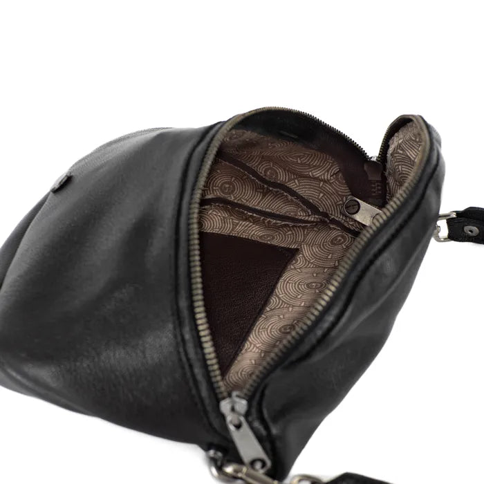 Black leather handbag with patterned interior on a white background