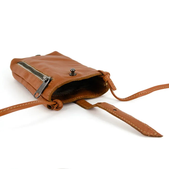 Brown leather crossbody bag on a white background