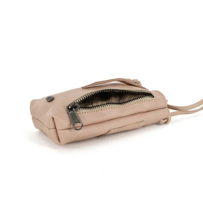 Light pink handbag with a zipper on a white background