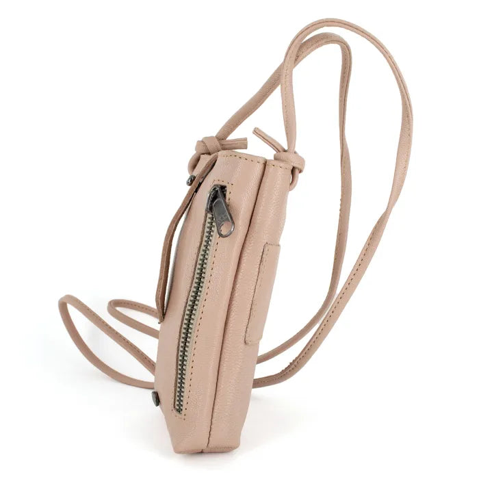 Light pink crossbody bag with a strap on a white background
