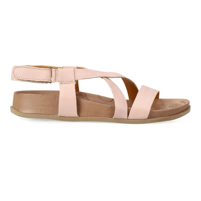 Pink sandal with multiple straps on a white background