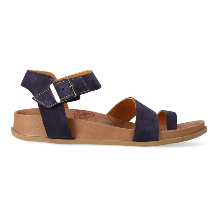 Navy sandal with a brown sole on a white background