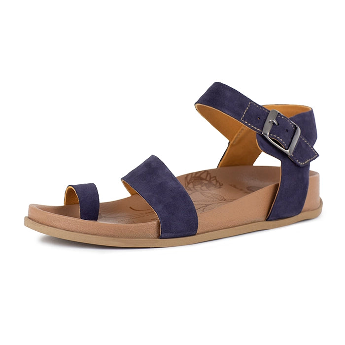 Navy sandal with a brown sole on a white background