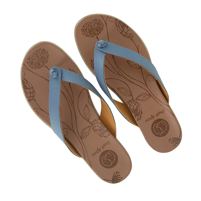 Pair of flip-flops with blue straps on a white background
