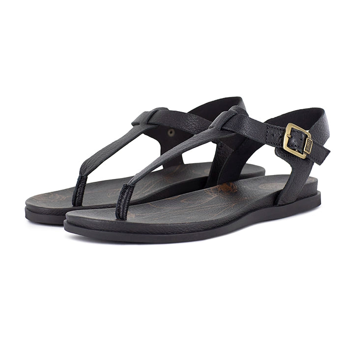 Black sandals with a gold buckle on a white background