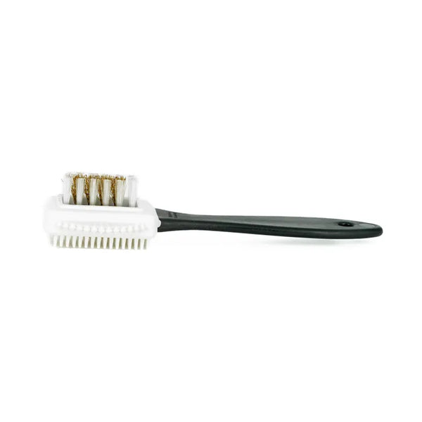 Cleaning brush with white bristles and black handle on a white background