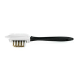 Cleaning brush with black handle and white bristles on a white background