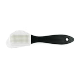 Cleaning brush with black handle and white bristles on a white background