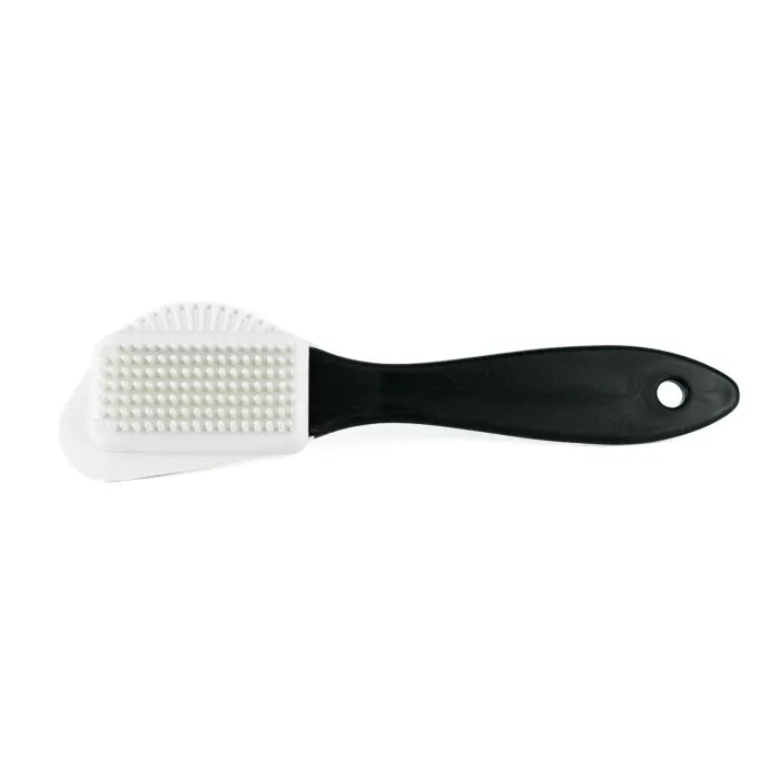 Cleaning brush with black handle and white bristles on a white background