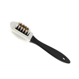 Cleaning brush with black bristles and black handle on a white background