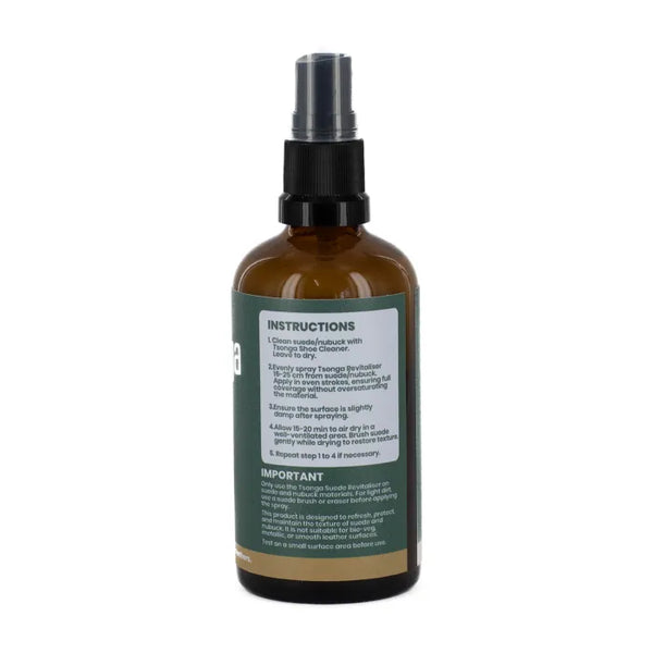 Brown spray bottle with a label on a white background
