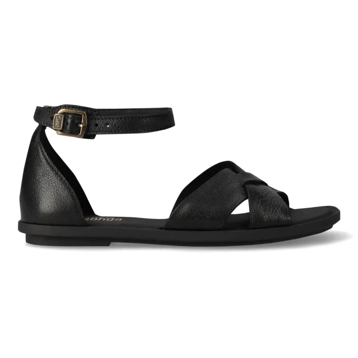 A black leather flat sandal with an ankle strap and buckle, shown in a side profile on a white background.