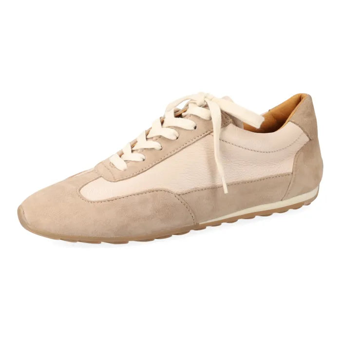 A low-top sneaker in beige suede and cream leather panels, featuring cream laces and a beige outsole, shown from a side profile on a white background.