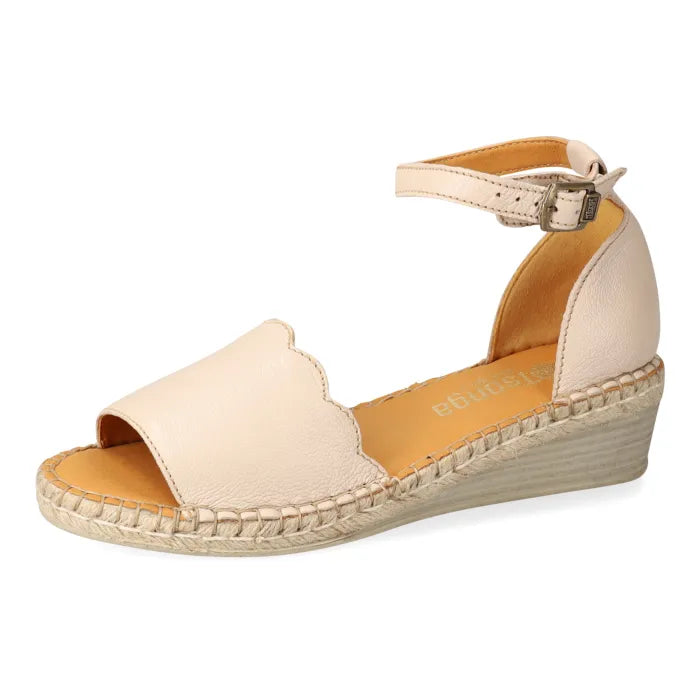 Beige wedge sandal with espadrille sole on a white background