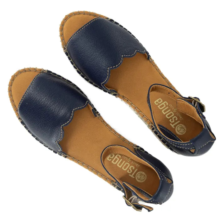 Pair of sandals with navy straps and brown soles on a white background