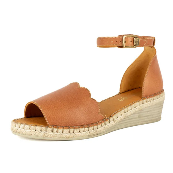 Brown wedge sandal with open toe and espadrille sole on a white background