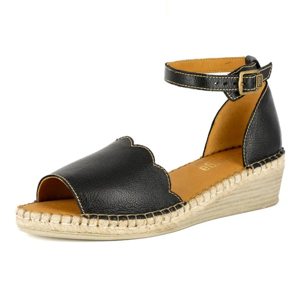 Black wedge sandal with espadrille sole on a white background