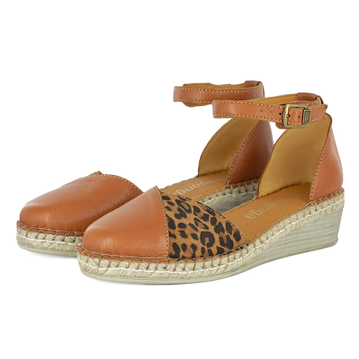 Brown wedge sandals with leopard print and espadrille sole on a white background