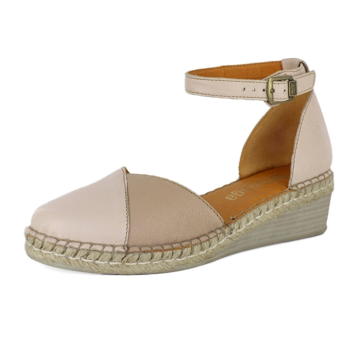 Beige wedge sandal with espadrille sole on a white background