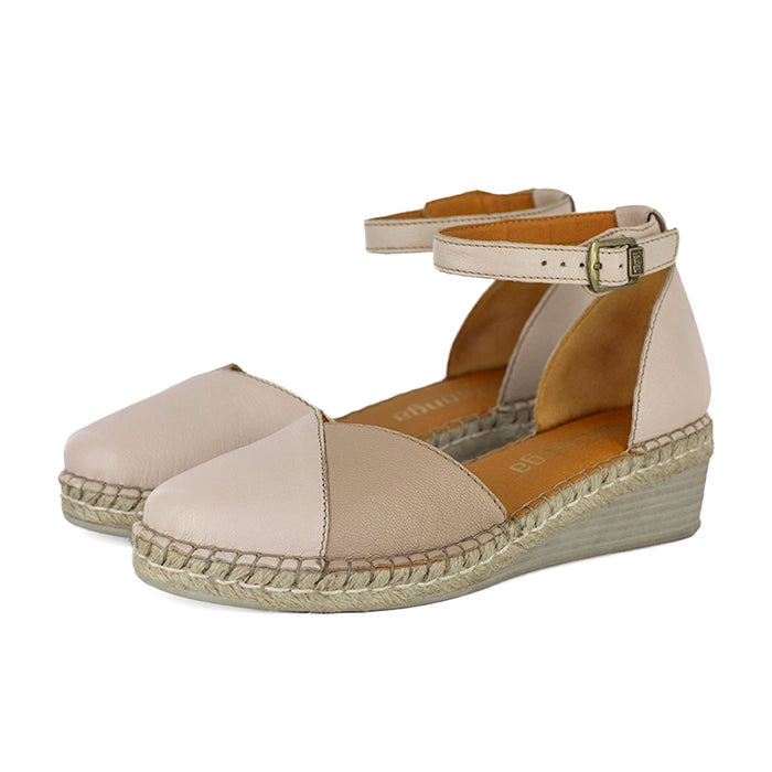 Beige wedge sandal with espadrille sole on a white background