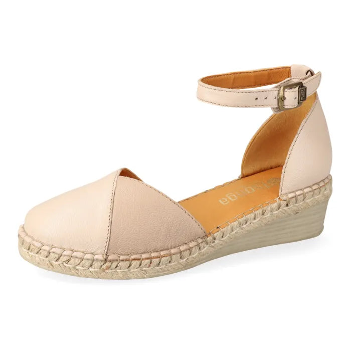 Beige wedge sandal with espadrille sole on a white background