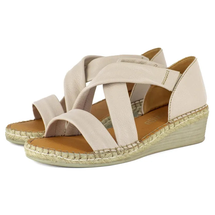 Beige wedge sandals with espadrille sole on a white background