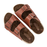 Pair of brown sandals with buckles on a white background