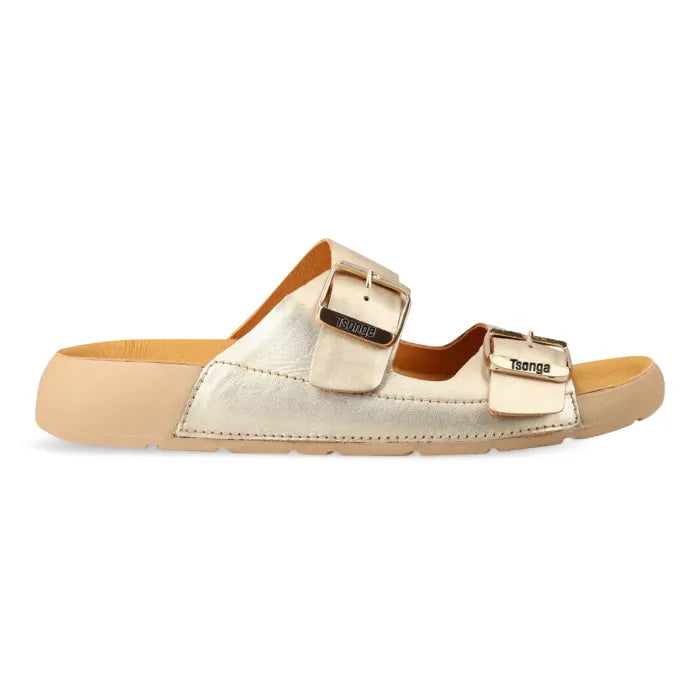 A single Tsonga double-strap slide sandal in metallic champagne gold with a tan footbed and sole, shown from a side profile on a white background.