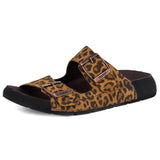 Leopard print sandal with black sole on a white background