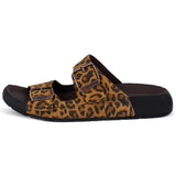 Leopard print sandal with brown buckle on a white background