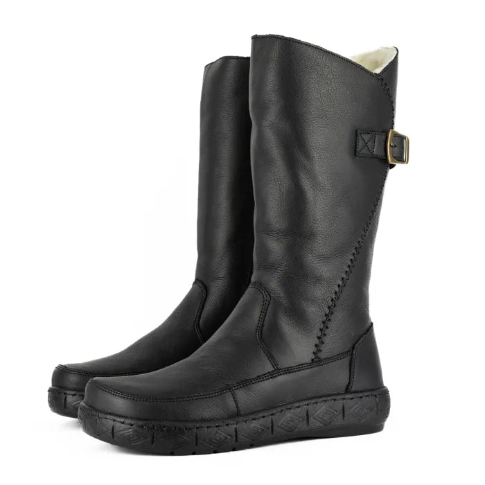 Pair of black leather boots with a buckle on a white background