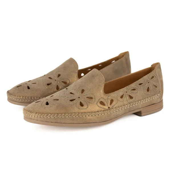 Pair of beige loafers with cut-out design on a white background