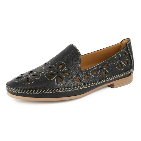 Black loafer shoe with floral cut-out design on a white background