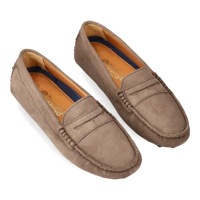 Pair of brown loafers on a white background