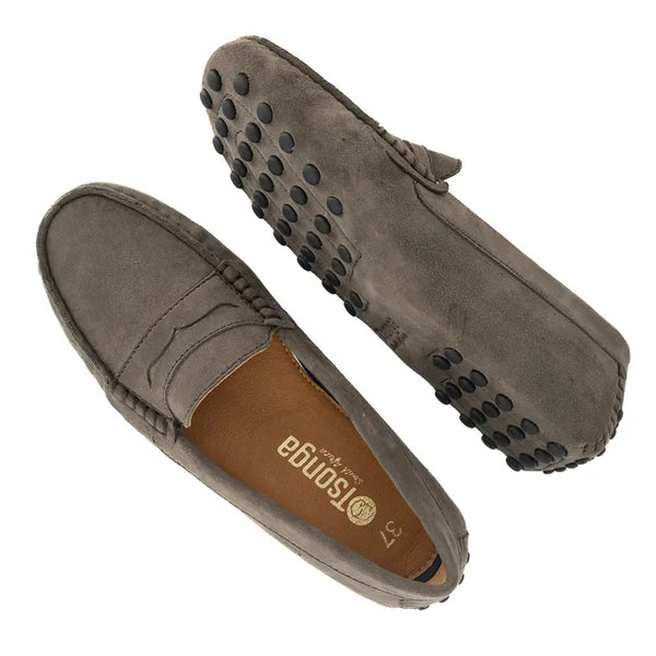 Pair of brown suede loafers on a white background