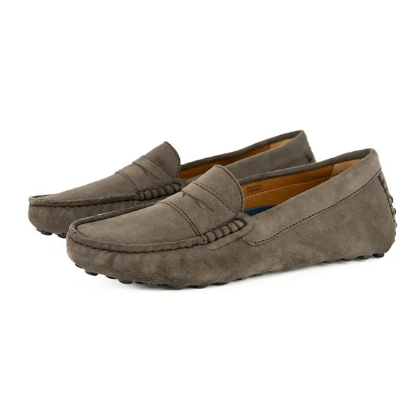 Pair of brown suede loafers on a white background
