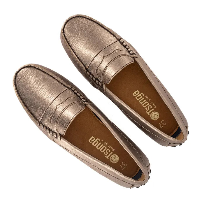 Pair of bronze loafers on a white background