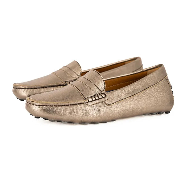 Pair of gold loafers on a white background
