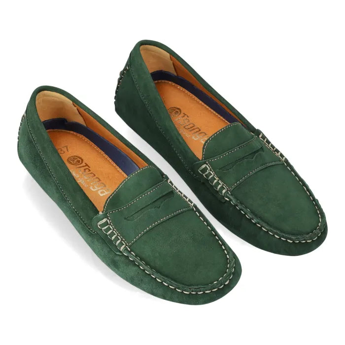 Pair of green loafers on a white background