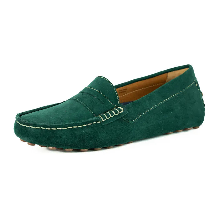 Green suede loafer shoe on a white background