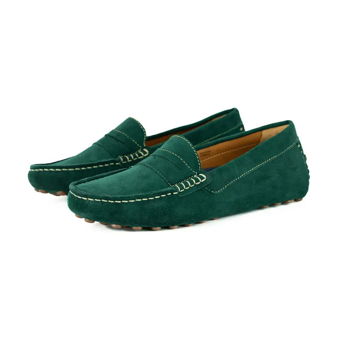 Pair of green loafers on a white background
