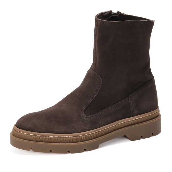 Brown suede boot on a white background