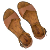 Pair of tan sandals with 'Tsonga' branding on a white background