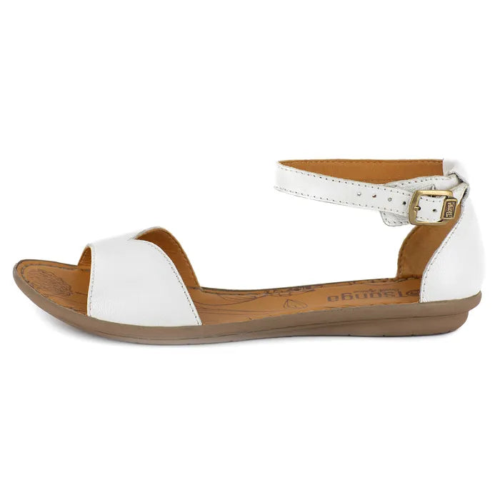 White sandal with brown sole on a white background