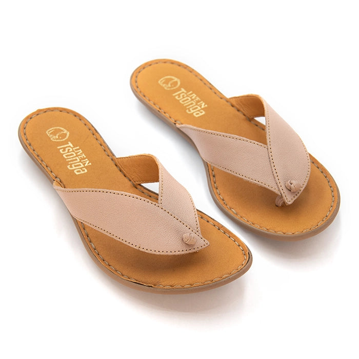 A pair of Tsonga leather thong sandals in a light pink color, displayed on a clean white background.