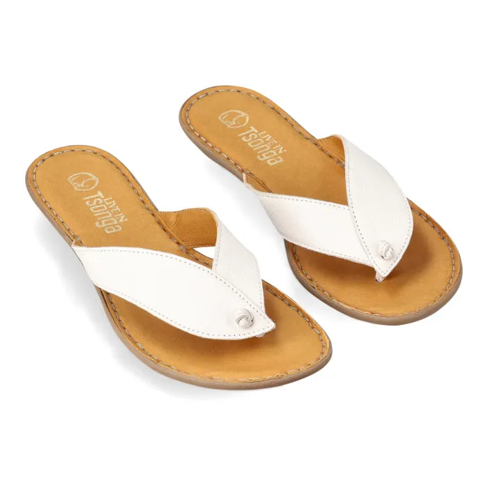 A pair of white leather thong sandals with tan soles, shown on a clean white background. The brand name 'Tsonga' is printed on the insole.