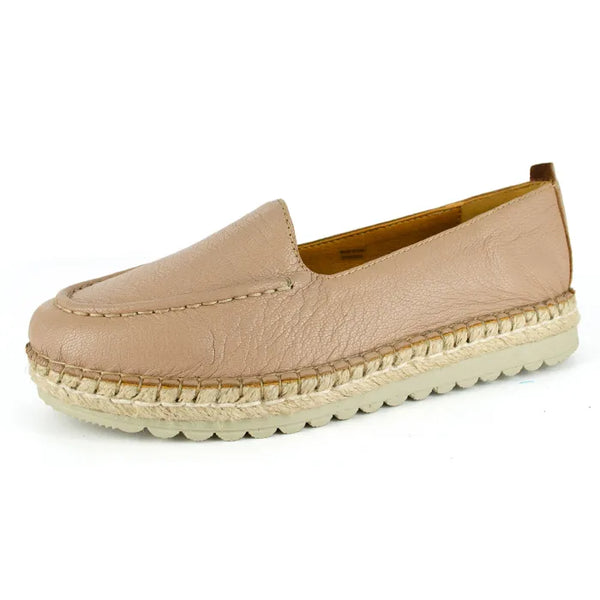 Beige espadrille shoe on a white background