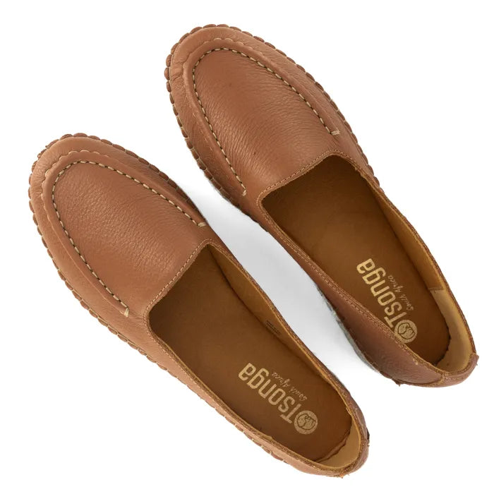 Pair of brown leather loafers on a white background