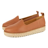 Pair of brown espadrille shoes on a white background
